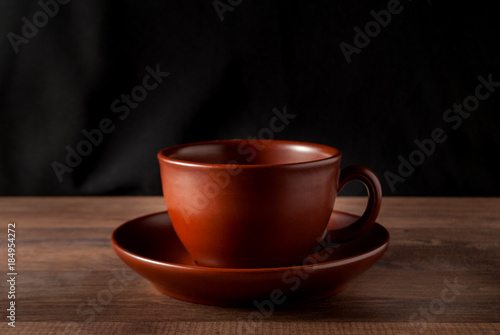 a cup of coffee on a plate