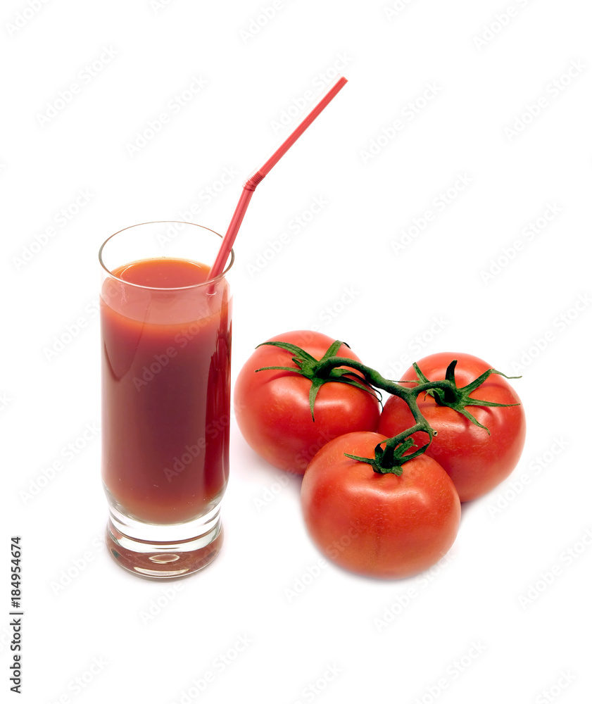 A glass with tomato juice with drinking straw and three ripe tomatoes studio shot isolated on white background A glass with tomato juice with drinking straw and three ripe tomatoes studio shot isolated on white background