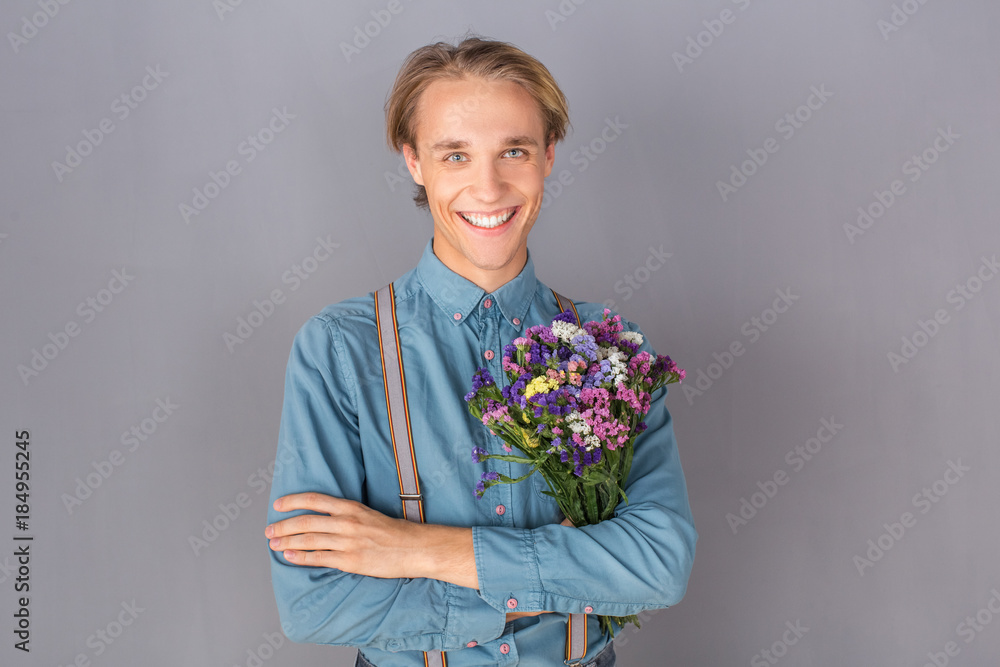 © Sergii - Young person studio isolated on grey wall