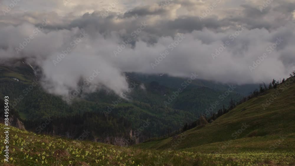 Russia, time lapse. The formation and movement of clouds over the summer slopes of Adygea Bolshoy Thach and the Caucasus Mountains Russia, time lapse. The formation and movement of clouds over the summer slopes of Adygea Bolshoy Thach and the Caucasus Mountains