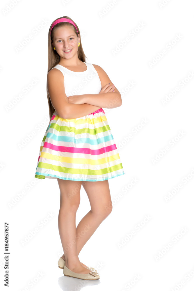 Fototapeta premium A teenage girl in a short dress.