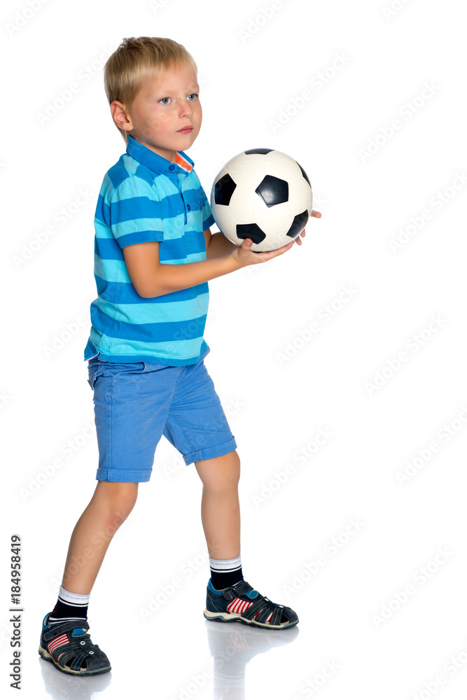 Little boy with a soccer ball