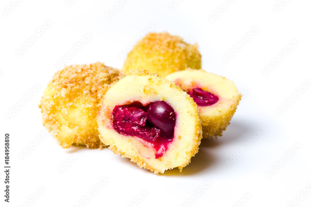 Homemade bread crumb dumplings with cherry isolated Homemade bread crumb dumplings with cherry isolated