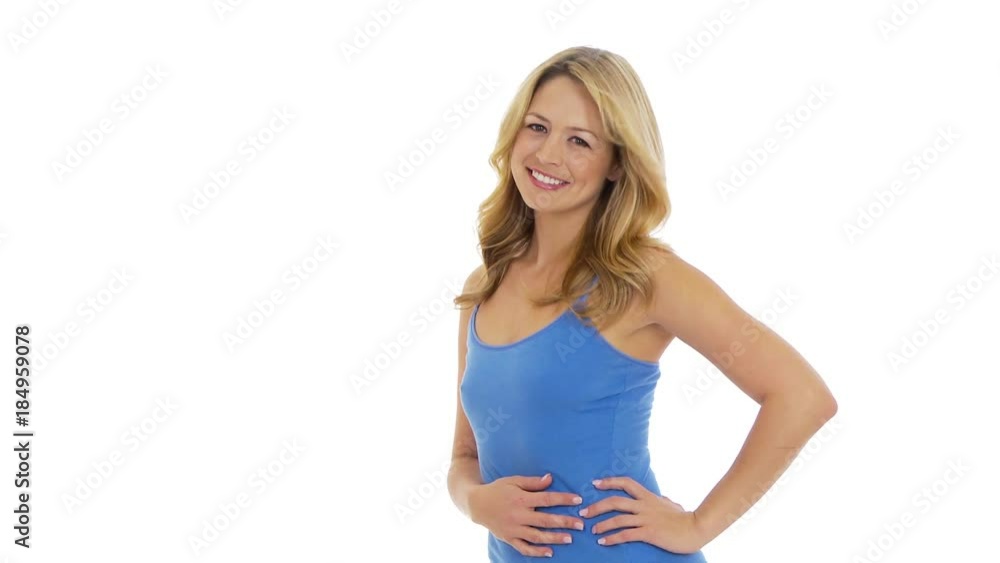 Sexy young woman smiling at camera on white background Sexy young woman smiling at camera on white background