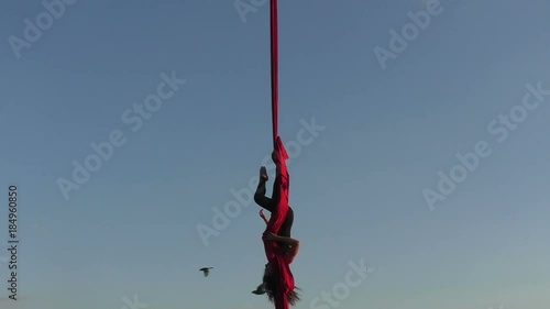 Acrobat falls during the trick, she performs the show.