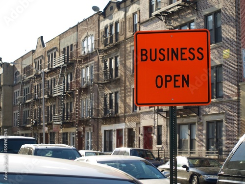 Orange Business Open Sign Real Estate  photo