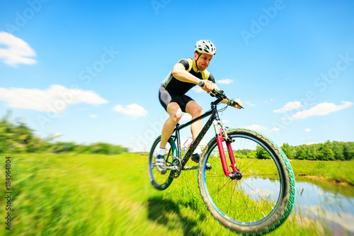 Young Man Riding His Mountain Bike