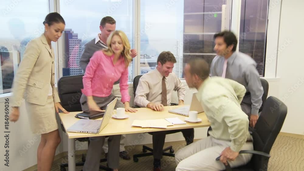 Businesspeople clapping and concluding meeting Businesspeople clapping and concluding meeting