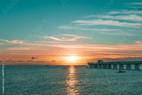 boats and morning sunshine by the pier