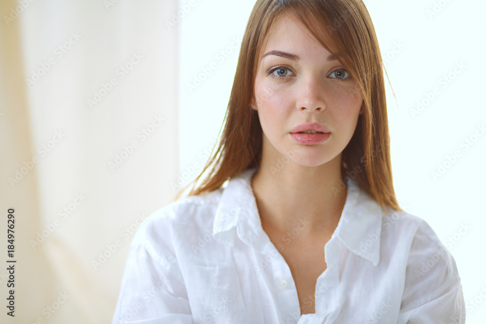 Portrait of beautiful young woman face. Isolated on white background. Portrait of beautiful young woman face. Isolated on white background.