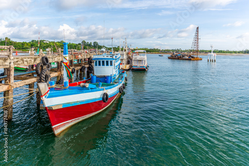 Fishing boats moored at the pier