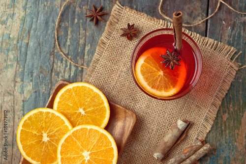 Bild auf Leinwand Christmas mulled wine on a rustic wooden table. Holidays concept.