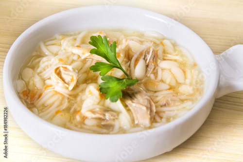 noodle soup with chicken and parsley