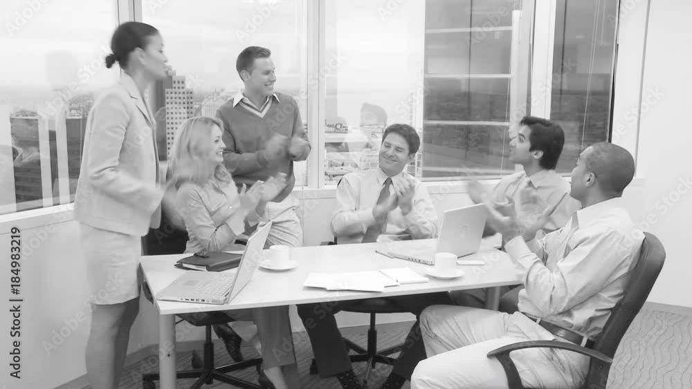 Businesspeople clapping in meeting Businesspeople clapping in meeting