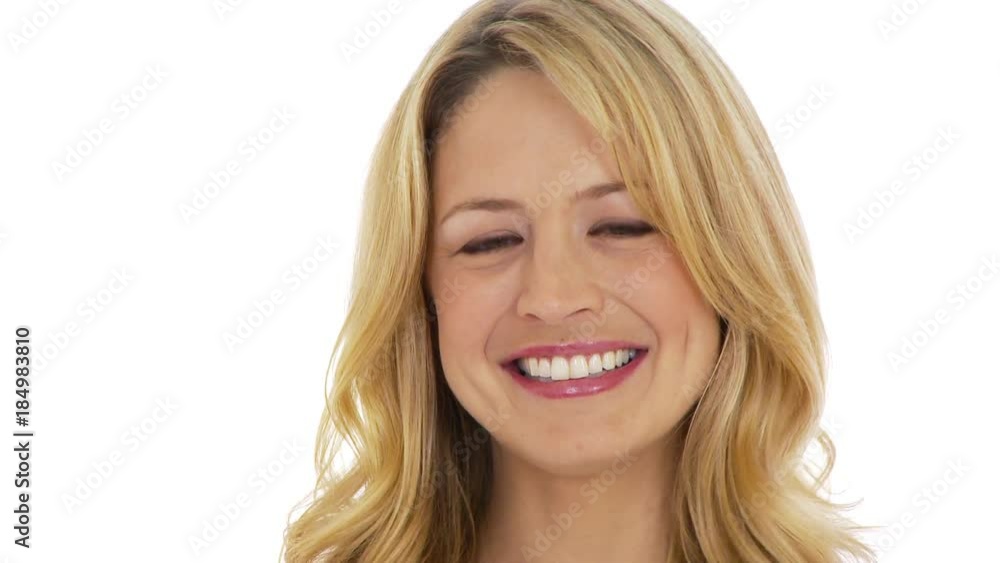 Young woman smiling at camera on white Young woman smiling at camera on white