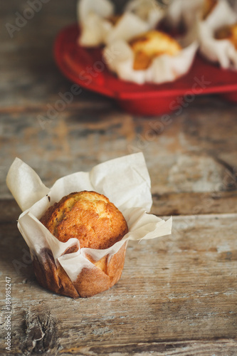 muffins in paper forms for baking - a delicious treat (cupcakes for dessert)