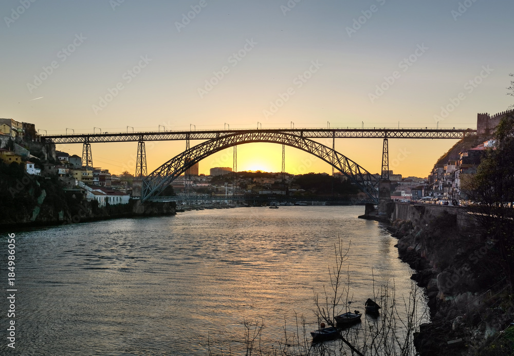 Large panoramic view on amazing sunset at Dom Luis I bridge, Porto. Portugal