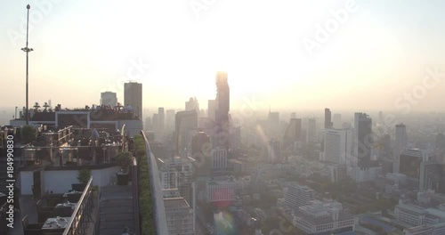 BANGKOK, THAILAND, MARCH 2017: view over Central Bangkok from the rooftop of Banyan Tree hotel at sunset photo