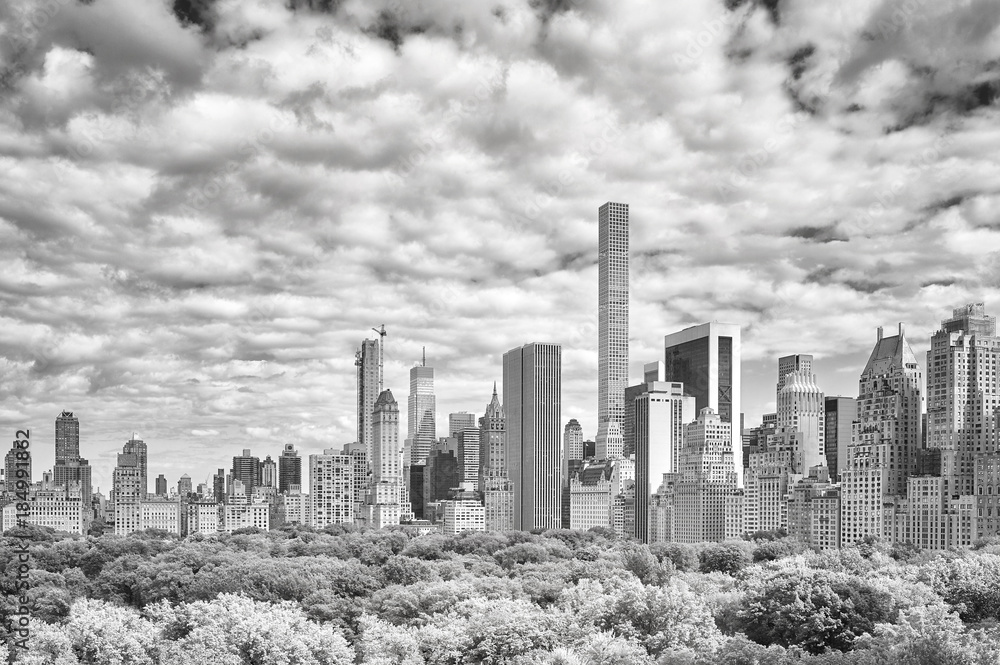 Black and white picture of the New York City skyline over Central Park, USA.