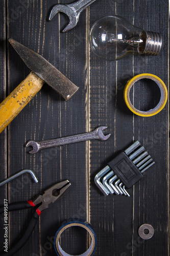 Joinery tools on a dark wooden table. Place for the text. A concept for Father's Day.