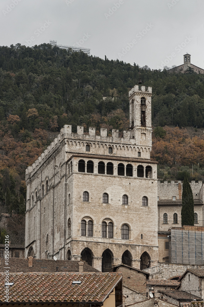 Gubbio, Perugia, Italy - The facade of Palazzo dei Consoli. The palace is located in Piazza Grande, in Gubbio, and is one of the most impressive public buildings in Italy