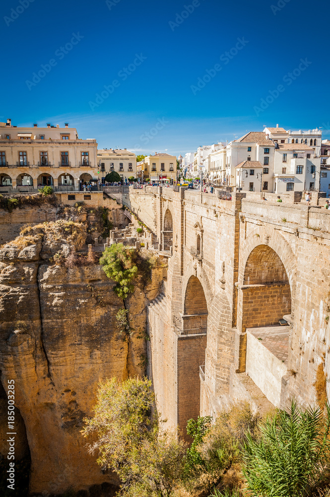 Ronda bridge. Panorama of the city, canyon and landscape
