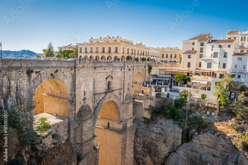 Ronda bridge. Panorama of the city, canyon and landscape