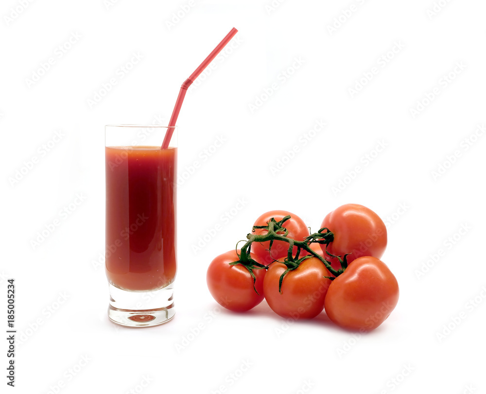 A glass with tomato juice with drinking straw and three ripe tomatoes studio shot isolated on white background A glass with tomato juice with drinking straw and three ripe tomatoes studio shot isolated on white background