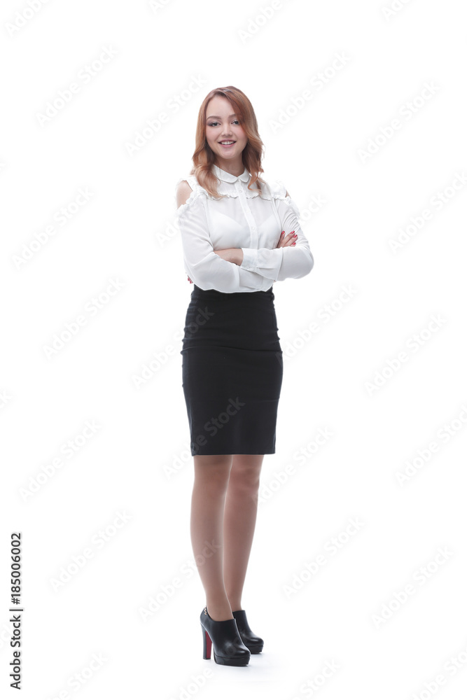 Full length portrait of businesswoman standing with arms folded Full length portrait of businesswoman standing with arms folded