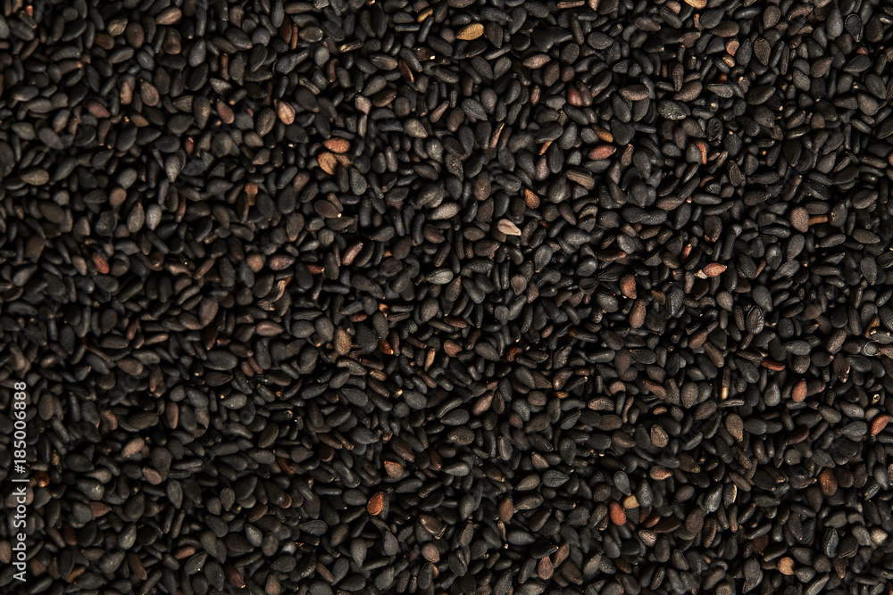 textured background of dark sesame textured background of dark sesame