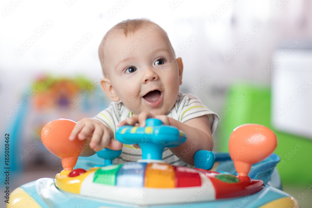 funny baby playing in baby jumper funny baby playing in baby jumper