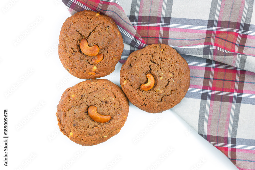 Cookie isolated on brown cloth and white background. Cookie isolated on brown cloth and white background.