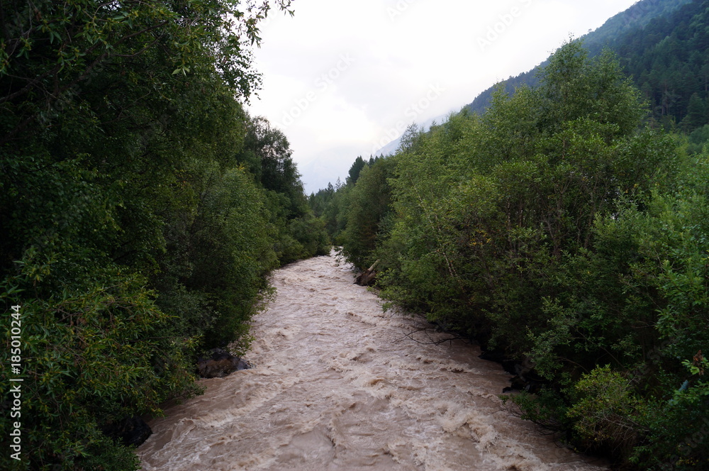 The mountain river is noisy, fast, dangerous. The mountain river is noisy, fast, dangerous.