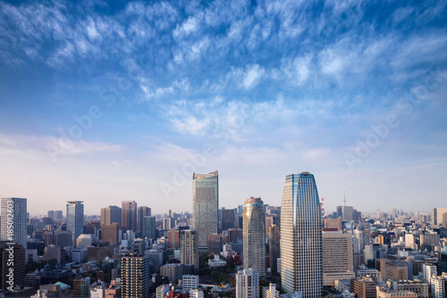 Landscape of tokyo city skyline in Aerial view with skyscraper  modern office building and blue sky with cloudy sky background in Tokyo metropolis  Japan.