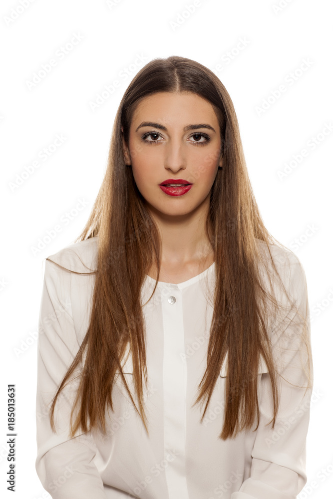 young woman with long hair on a white background young woman with long hair on a white background