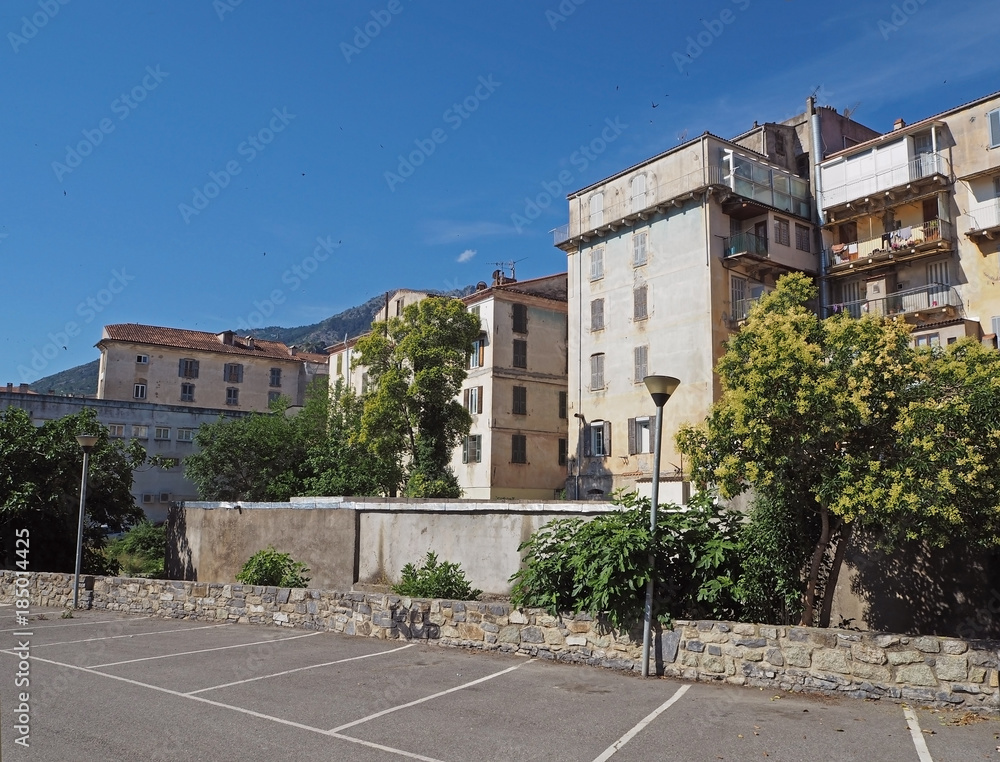 old rental houses in corte city corsica with blue sky background