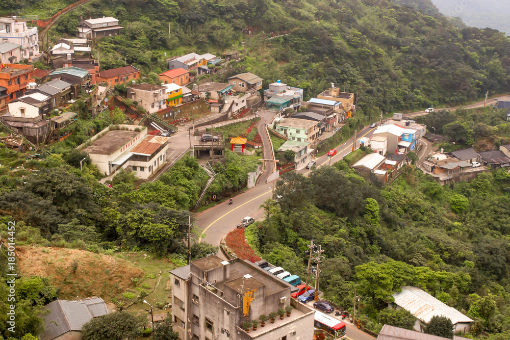 View of Jiufen village hillside buildings on the mountain in Taiwan