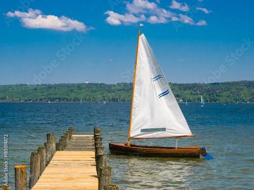 sailing boat tied to a pier, starnberger see, germany