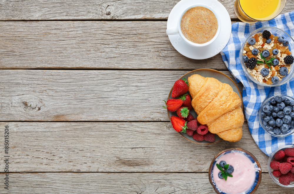 Tasty pastry, fruits and berries on rustic wood, top view Tasty pastry, fruits and berries on rustic wood, top view