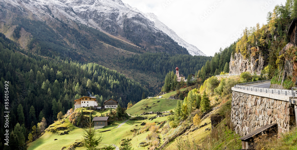 Church on the hill landscape, mountains and peaks in background, natural environment. Austria Alps, Vent, Europe.