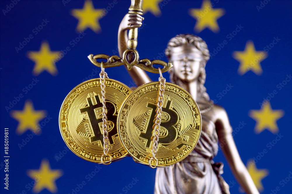 Φωτογραφία Symbol of law and justice, physical version of Bitcoin and European Union Flag