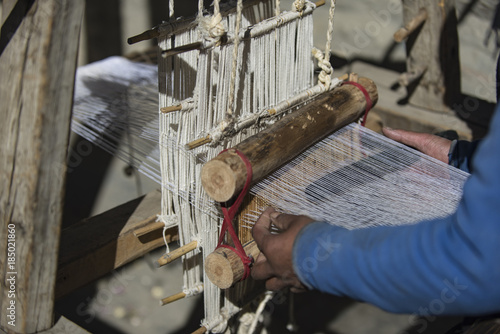 woman weaver in Nepal, the city of Manang. Mustang, Himalayas, December 2017