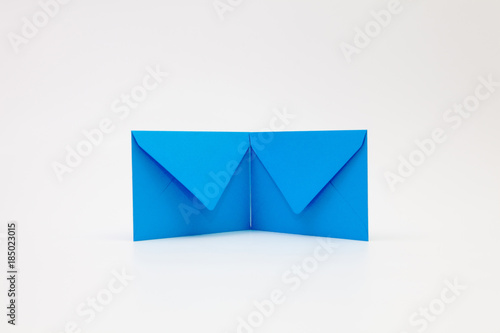 Blue envelopes and on the white desk