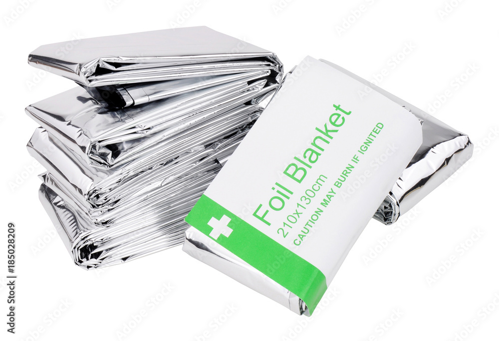 Emergency foil space blankets isolated on a white background Emergency foil space blankets isolated on a white background