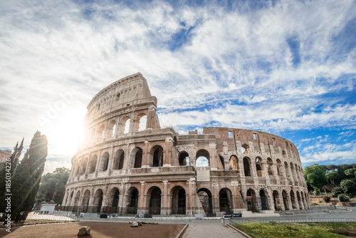 Colosseum at sunrise, Rome, Italy, Europe. Rome ancient arena of gladiator fights. Rome Colosseum is the best known landmark of Rome and Italy