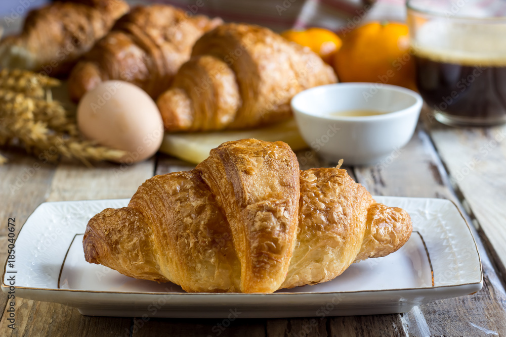 Continental breakfast with croissants