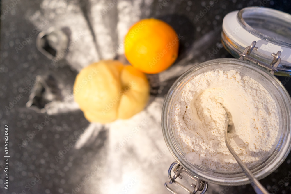 Fototapeta premium Dough with flour and orange