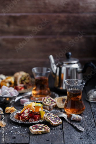 Turkish delight on a dark wood background.