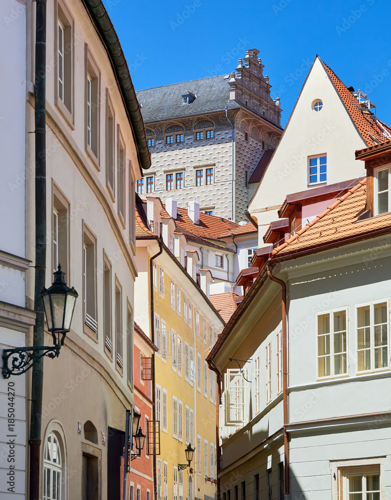 Historic colourful Arctitecture in the old town of Prague with the castle in the distance in the Czech Republic.
