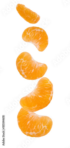 Fresh peeled mandarin orange segments isolated on white background with clipping path